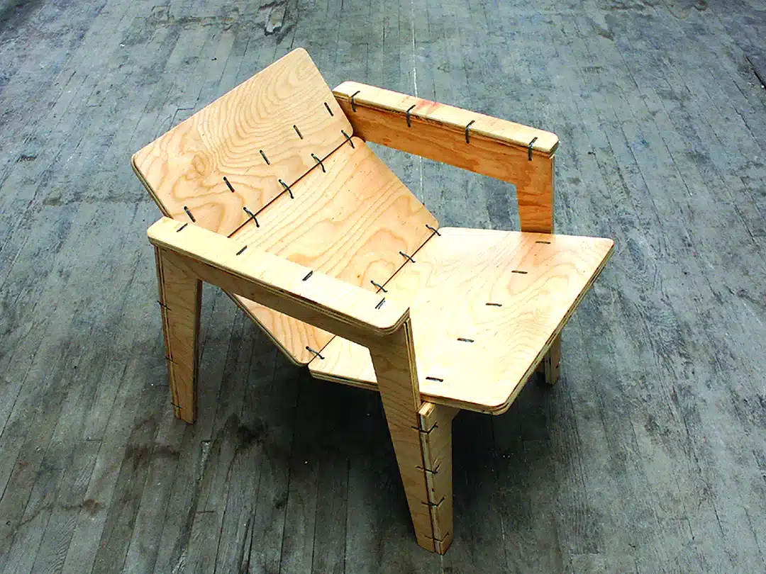 Nylon cable ties securing a plywood chair frame, with zip ties connecting drilled plywood panels