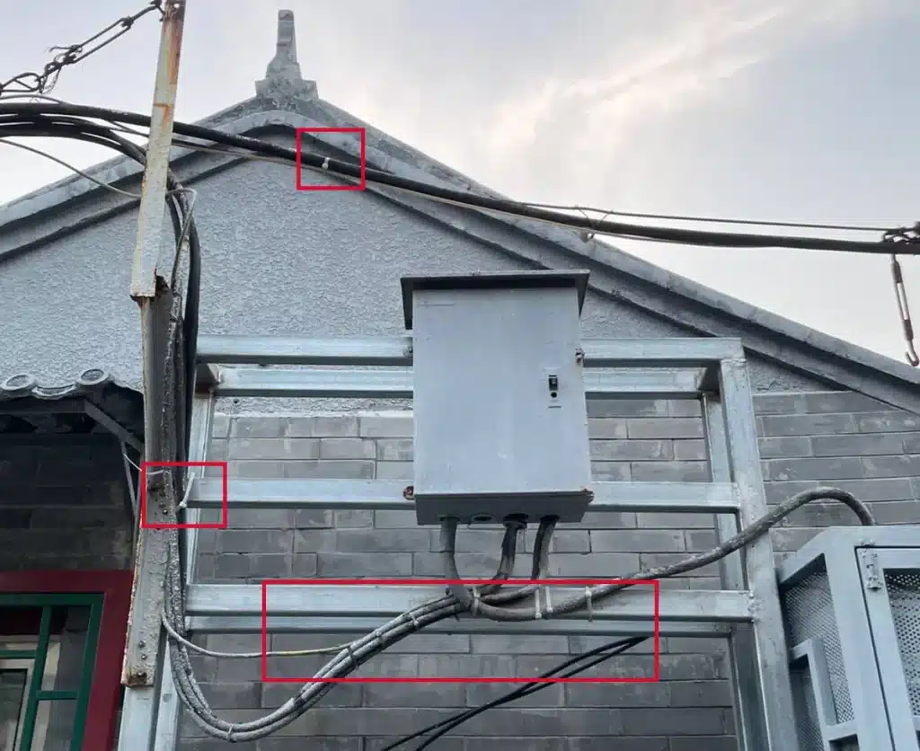 Nylon cable ties used to secure outdoor cables along a metal support structure, helping reduce cable movement and improve cable management